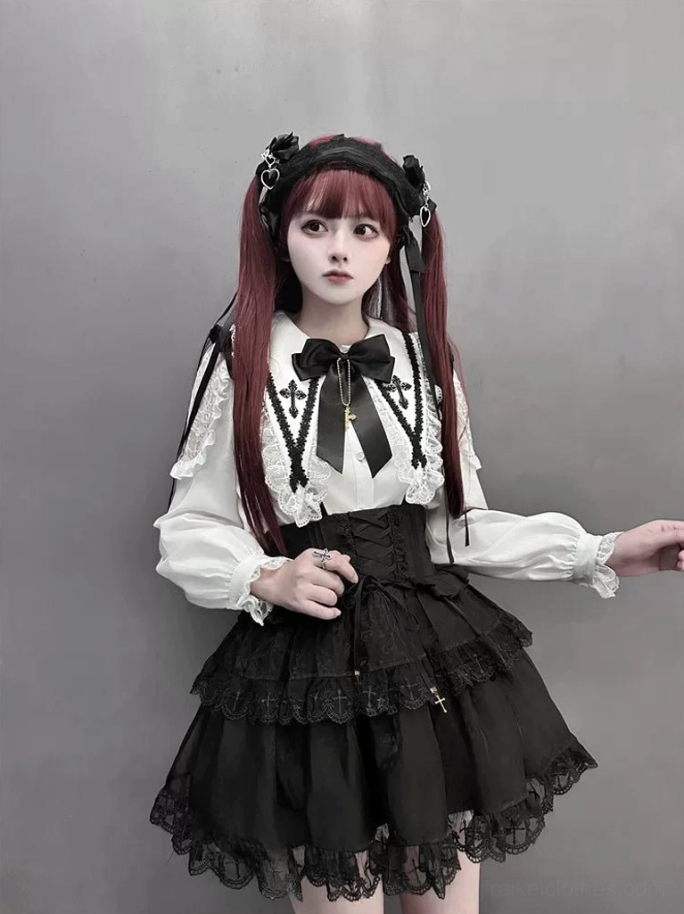 Jirai Kei suspender skirt and flutter sleeve blouse front view twin-tail model high-waisted corset layered ruffles cross pendant
