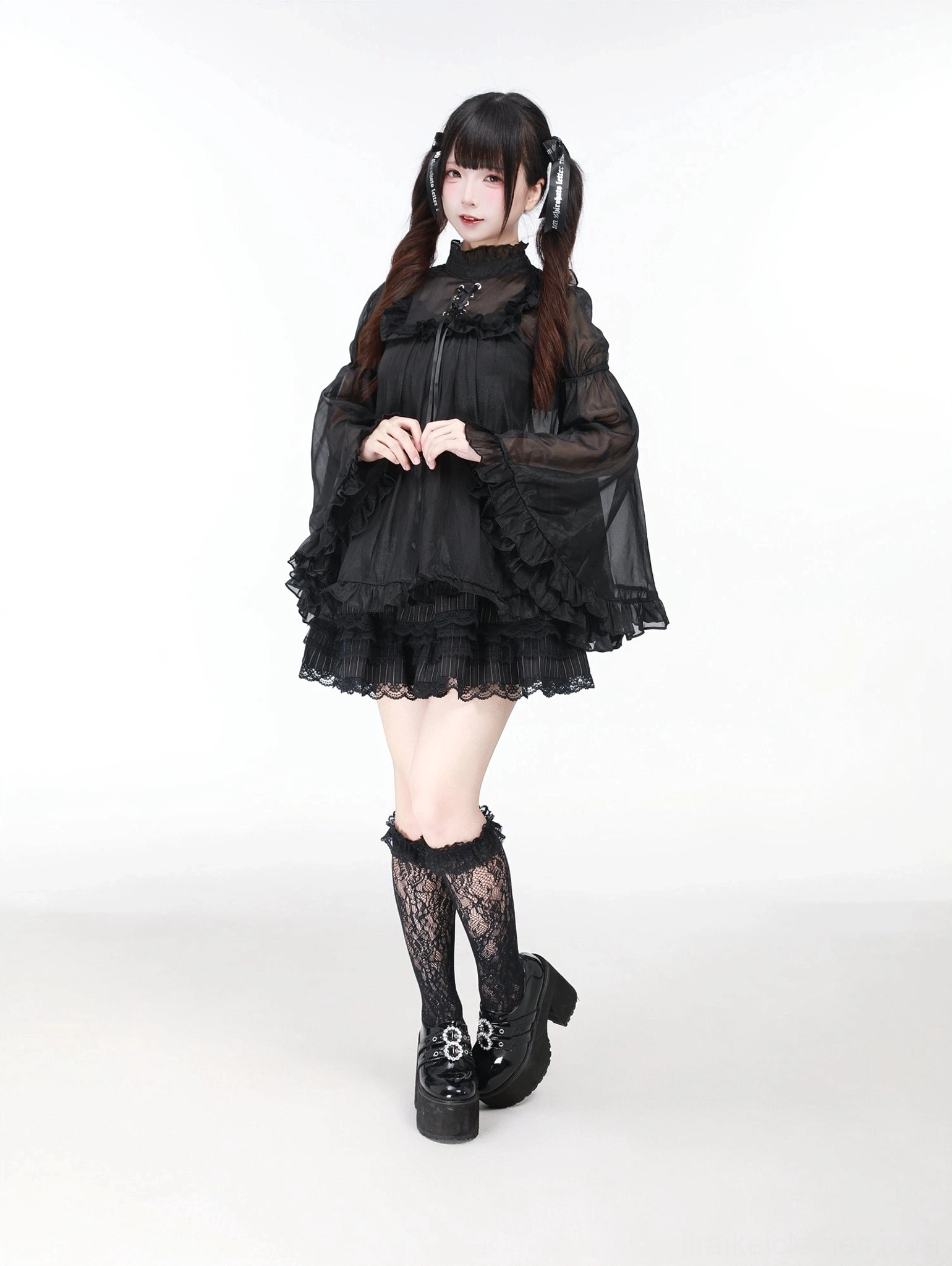 Jirai Kei ensemble movement shot showing hime sleeves in motion and dynamic silhouette photography