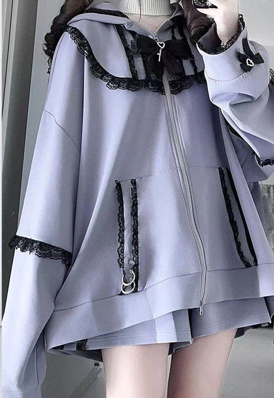 Jirai Kei hoodie with dual-zip front opening system allowing customizable layering and self-expression, detail view of zipper mechanisms and metal ring accents for street style