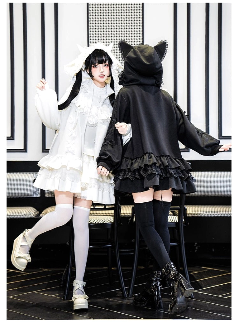 Black Jirai Kei hooded jacket back view cat ear hood ruffled skirt hem two models indoor seating