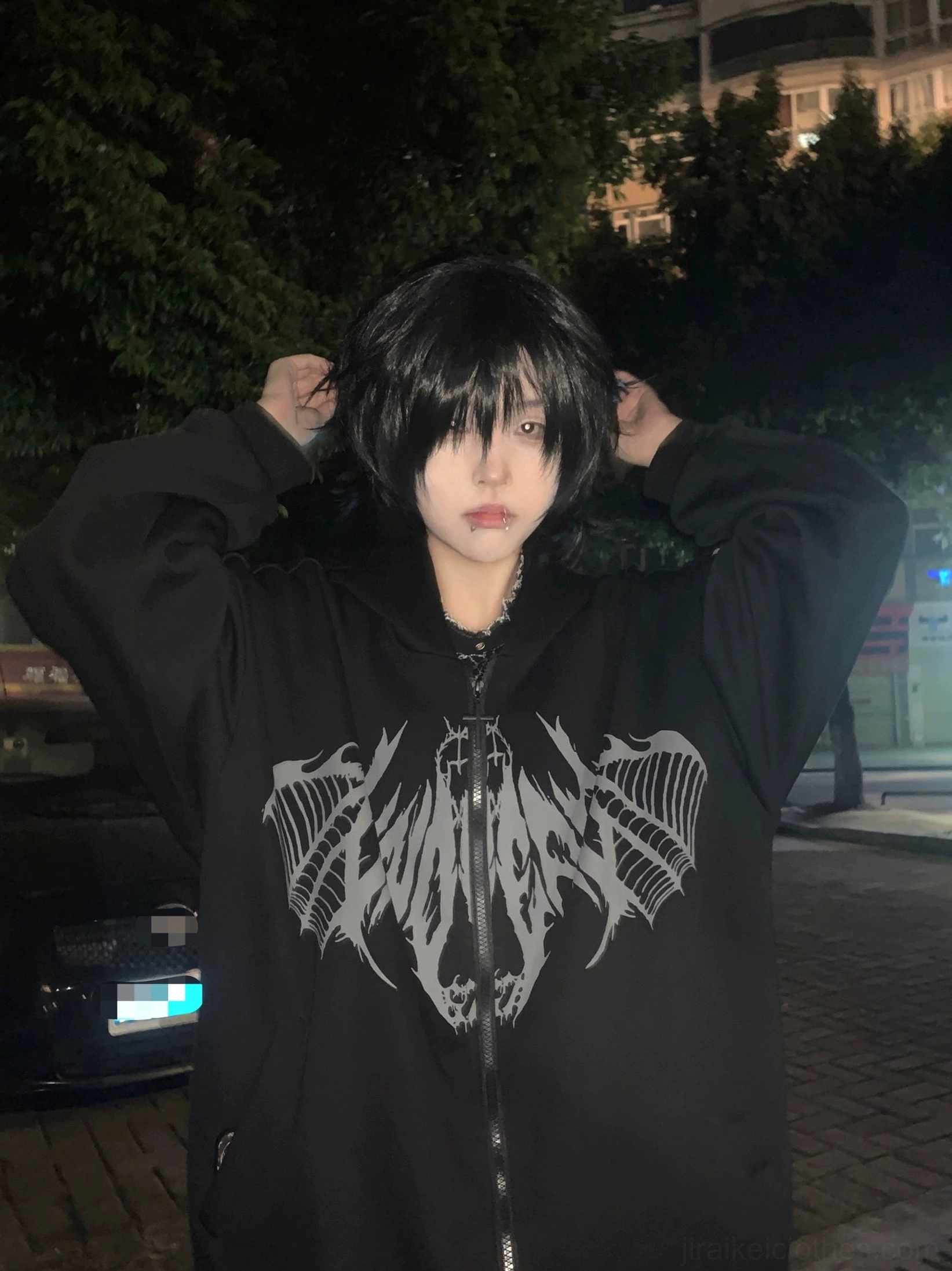Jirai Kei hoodie statement piece photography emphasizing artistic rebellion and authentic self-expression through punk goth subculture fashion