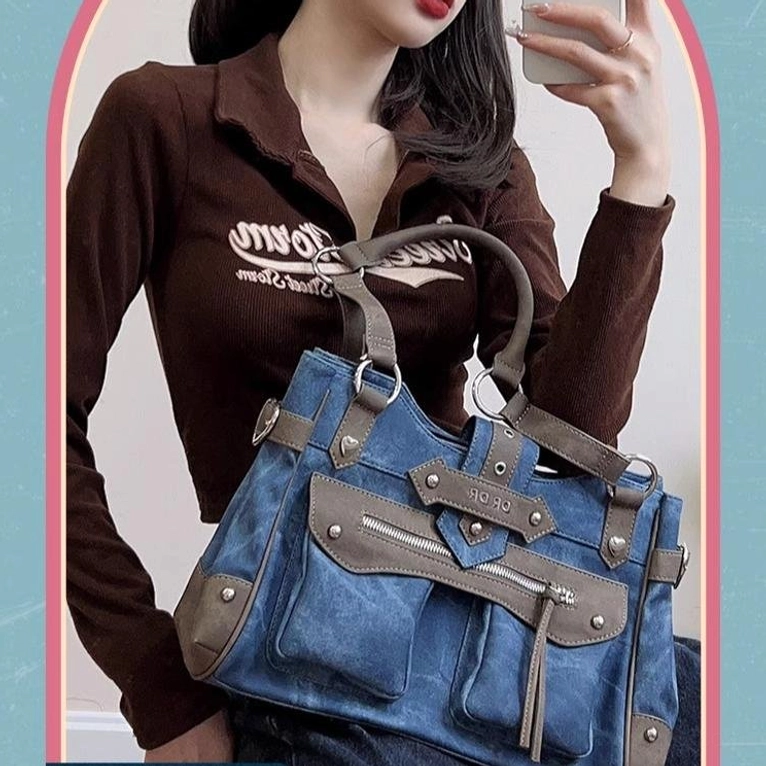 Jirai Kei ita bag detailed view of imitation denim leather material texture showing vintage distressed finish and premium fabric quality construction