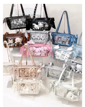 Flat lay collection of multiple colored ita bags with clear display windows showcasing various anime collectibles and badges