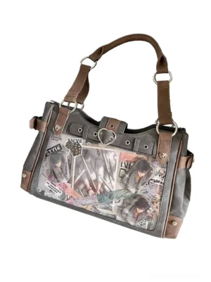 Jirai Kei ita crossbody bag dual-tone design with clear transparent window displaying anime collectibles and decorative pins, shown on plain white background highlighting heart-shaped metal hardware details