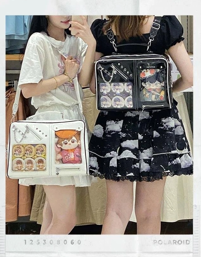 Large Jirai Kei ita laptop bags in black and white with anime pin displays and punk aesthetic elements