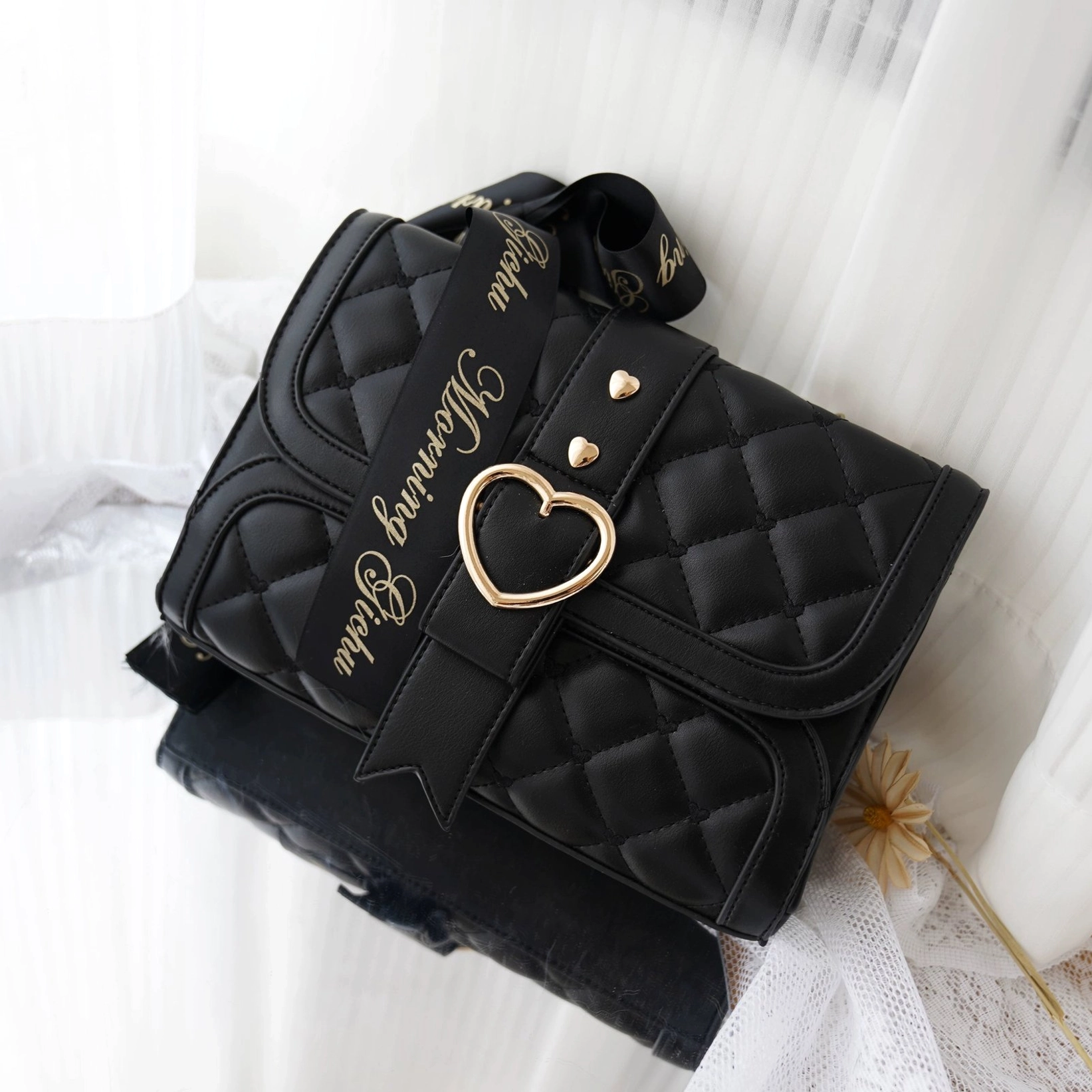 Patent leather black jirai kei ita shoulder bag with bow accent on transparent display window