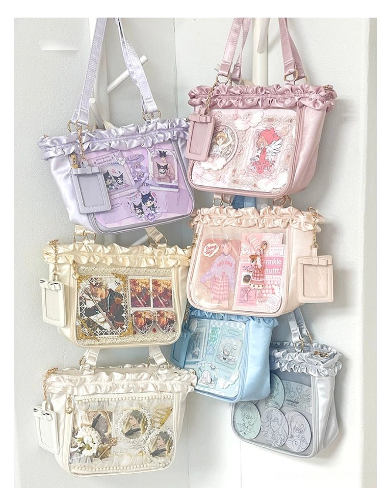 Anime-themed Jirai Kei itabag tote collection wall display featuring ruffled satin trim and clear card display windows in multiple vibrant colors