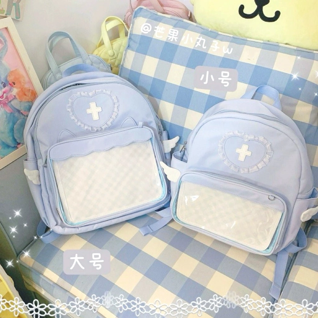 Blue S and L dual-size Jirai Kei itabag backpack collection set with transparent display windows, celestial heart embellishments and angel wing decorative accents