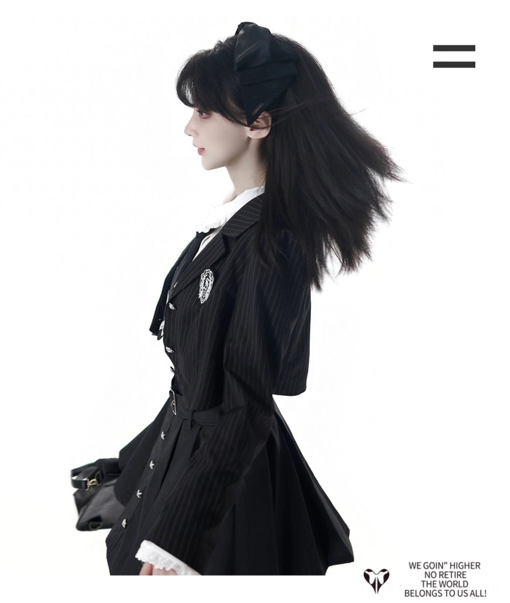 Jirai Kei JK uniform blouse detail featuring V-shaped chest ruffles, lace-trimmed cuffs, white fabric, and fitted silhouette on female model
