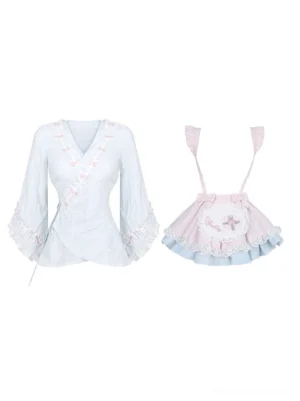 Separated Jirai Kei kimono blouse and suspender skirt pieces flat lay top-down view baby blue pink ruffled apron