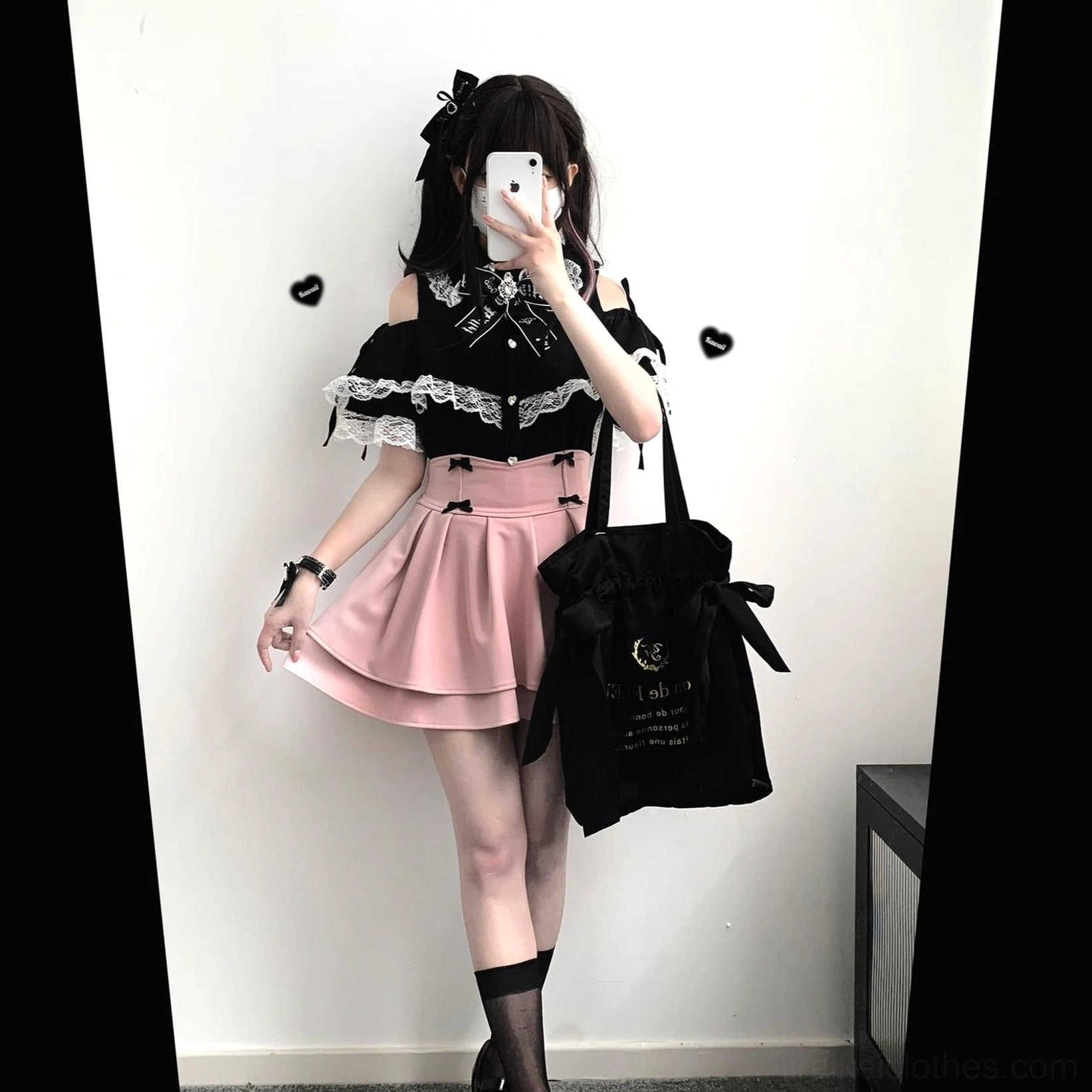 Jirai Kei lace off-shoulder blouse styled with black tote bag and pink layered skirt showing off-shoulder sleeves detail
