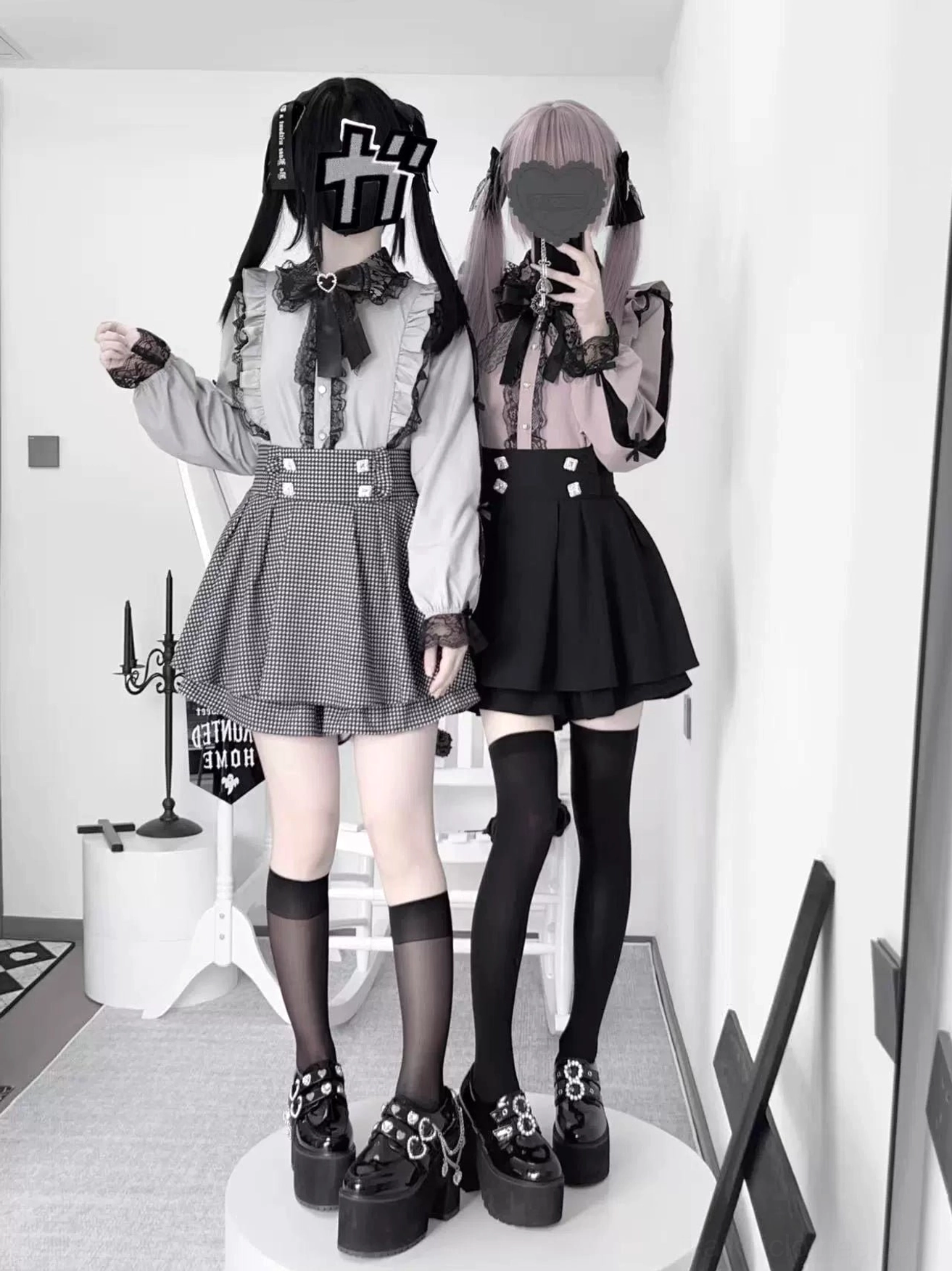 Jirai Kei lace blouse and high-waist pleated skirt complete outfit set front view two female models wearing water blue and black color options studio photography
