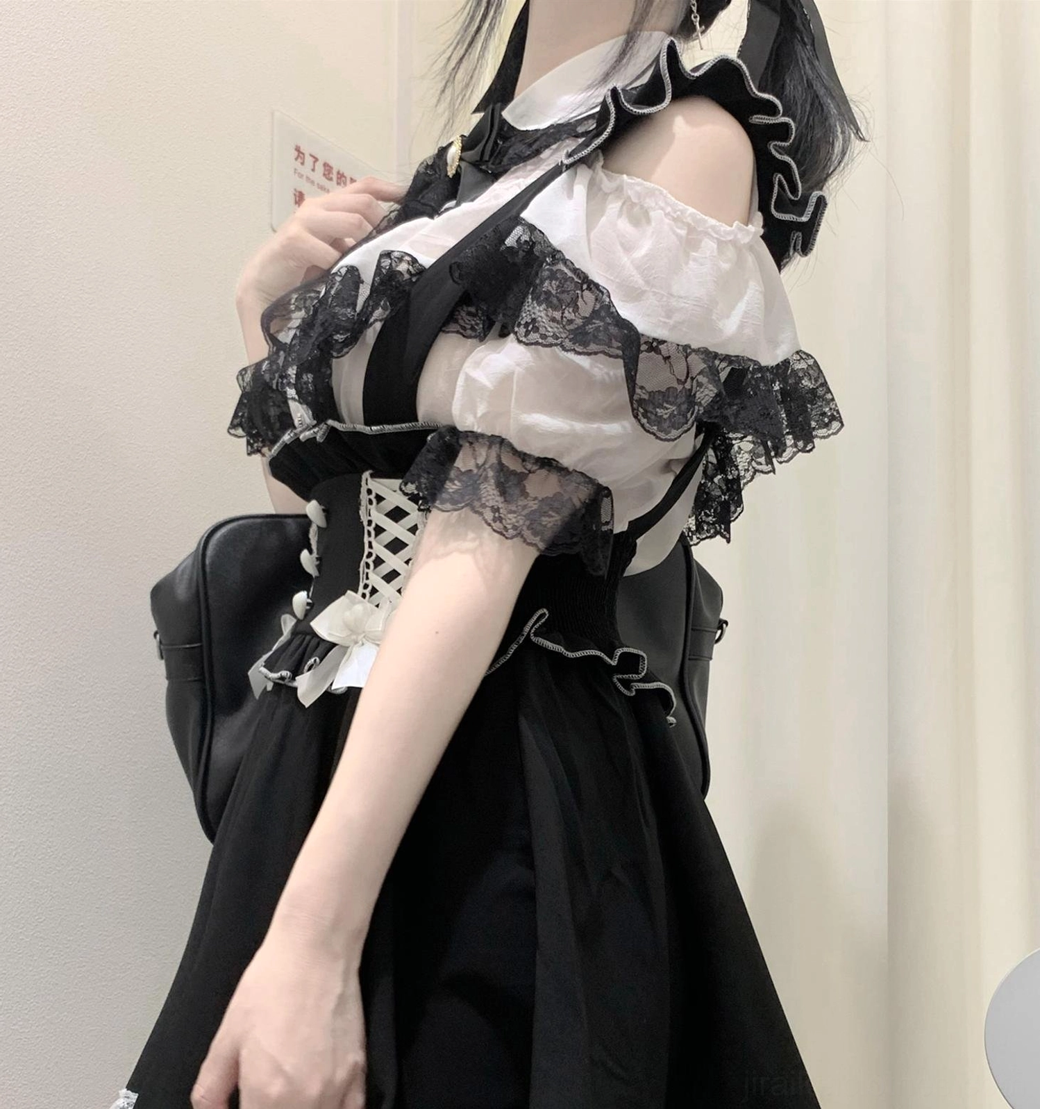Jirai Kei lace cold-shoulder blouse side view, showcasing open shoulder silhouette and ethereal polyester fabric construction