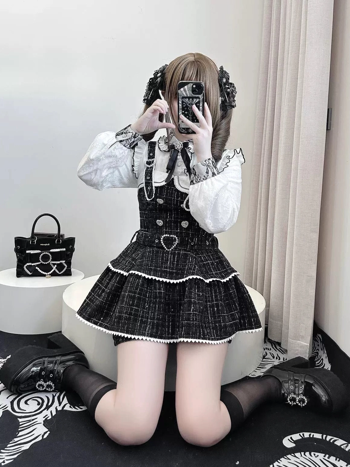 Jirai Kei blouse front selfie styling look brown-haired model wearing blouse with heart-shaped black tweed dress
