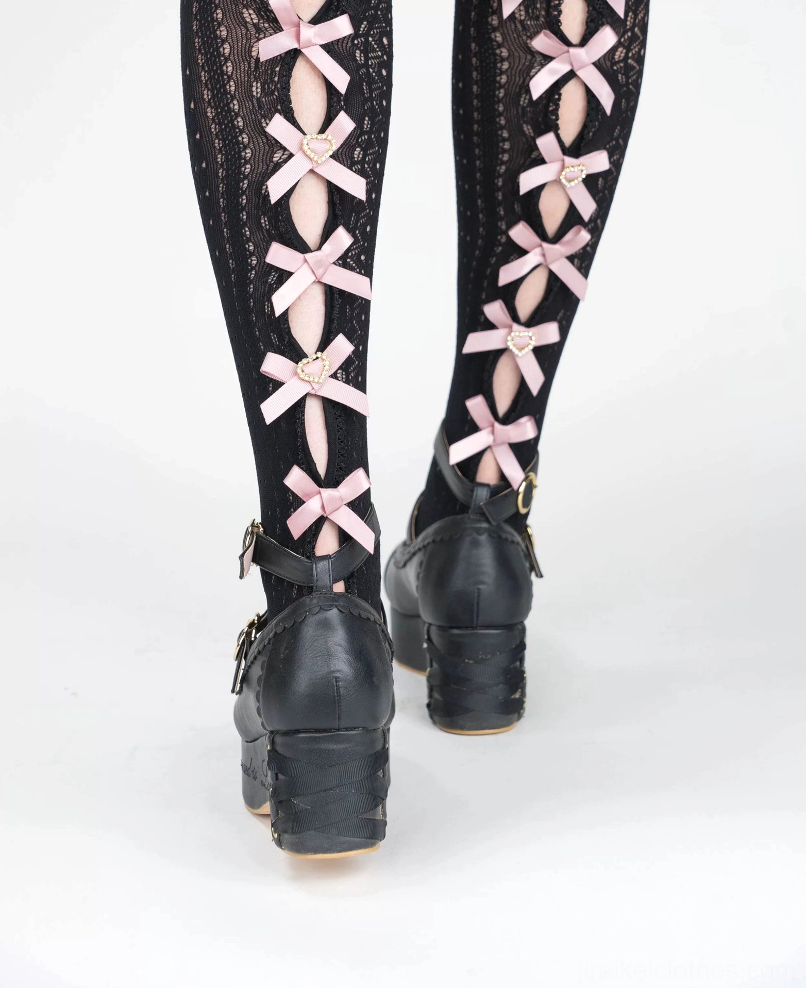 Black Jirai Kei lace bow socks rear view feet pink ribbon bows heart-shaped hardware black wedge platform shoes