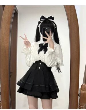 Black white lace cape blouse high waist plaid skirt jirai kei gothic outfit half body mirror front view with bow hair accessories