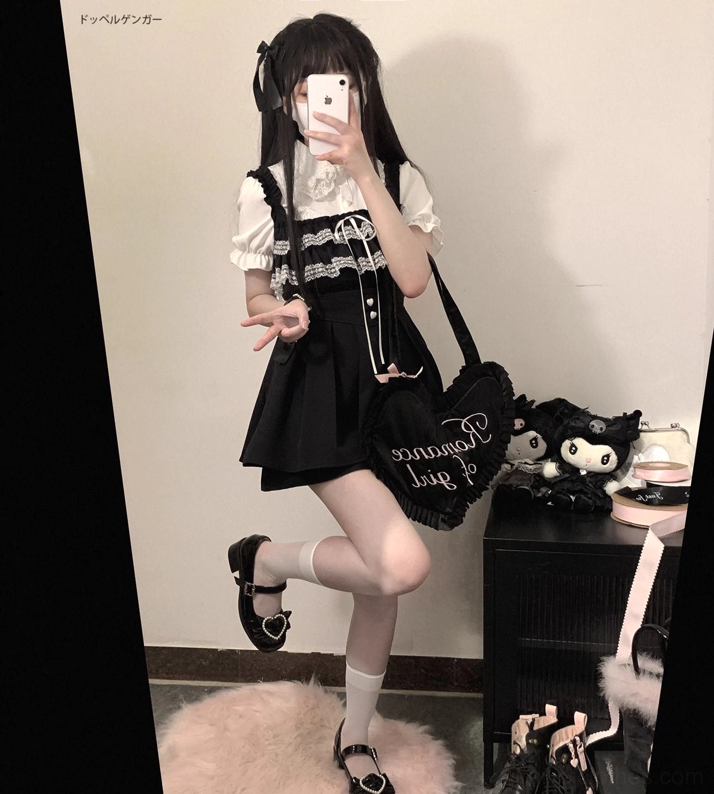 Black and white Jirai Kei two-piece lace collar blouse outfit with puff short sleeves and pleated skirt, mirror selfie three-quarter front view with plush toy decor