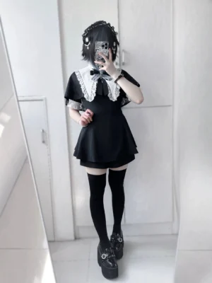 Jirai Kei black and white lace dress set back view mirror selfie showing detachable pointed collar cape and A-line flared skirt silhouette