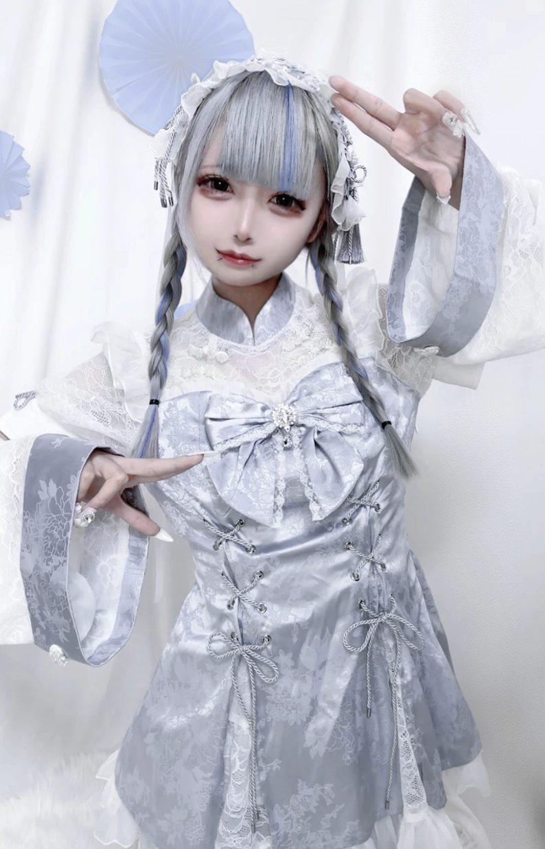 Jirai Kei Chinese lace dress three-quarter front angle showing large chest bow and cross-laced corset design