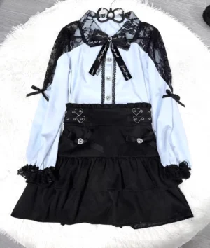 Jirai Kei lace blouse and tiered ruffled skirt set flat lay display showing lace peter pan collar and heart-shaped buckle strap details