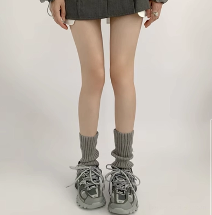 Dark taupe grey stacked ribbed jirai kei leg warmer 30cm ankle-calf length flat front view with chunky sneakers plain background
