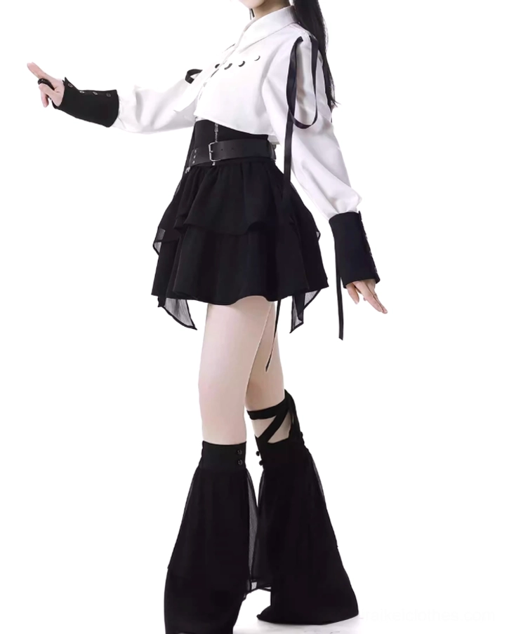 Jirai Kei leg warmers close-up showing black tiered construction, decorative lace-up strap details, and sophisticated gothic design elements for aesthetic styling