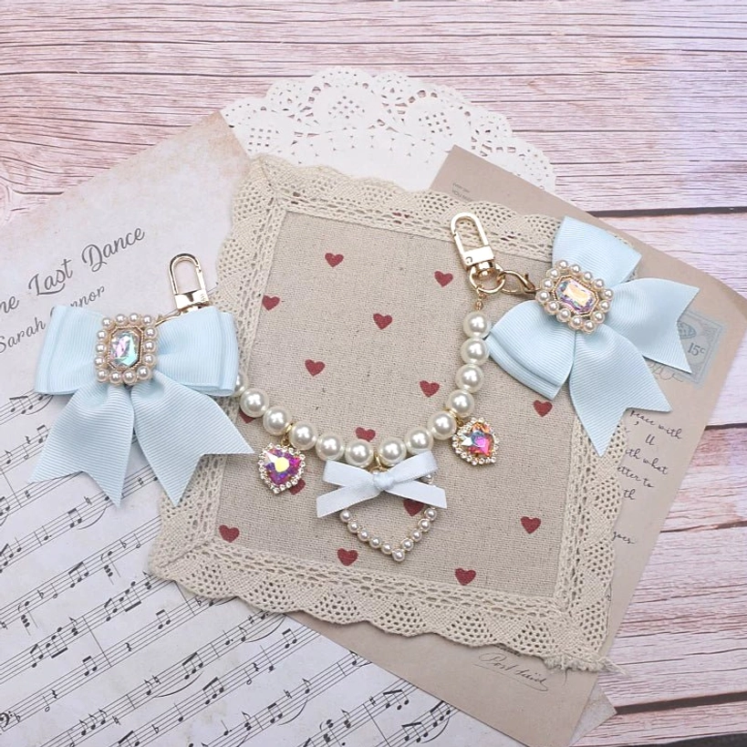 Light blue ribbon bow pair Jirai Kei bag charm pearl chain heart pendant rhinestone details