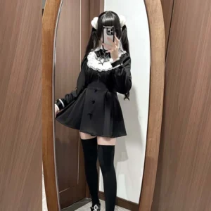 Full body black Jirai Kei dress set on model wearing thigh-high socks fitted waist A-line mini skirt complete outfit