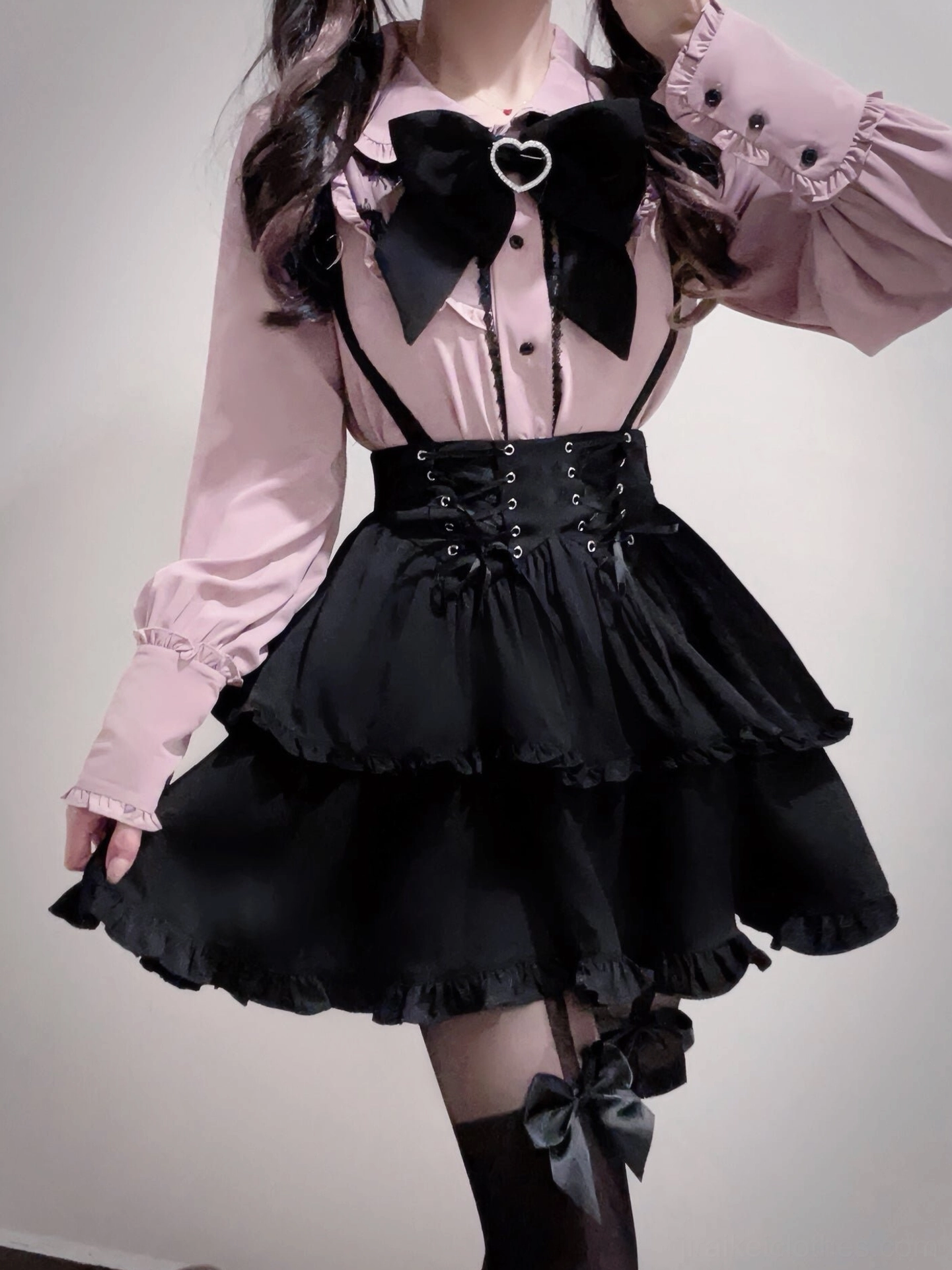 Jirai Kei fashion coordination showing long-sleeve pink blouse option with black suspender skirt, bow tie accessory, and complete aesthetic presentation