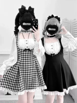 Front full-body view of houndstooth and black-white Jirai Kei maid dresses with integrated chokers, puffed sleeves, and lace-trimmed hems displayed on mannequins in studio setting