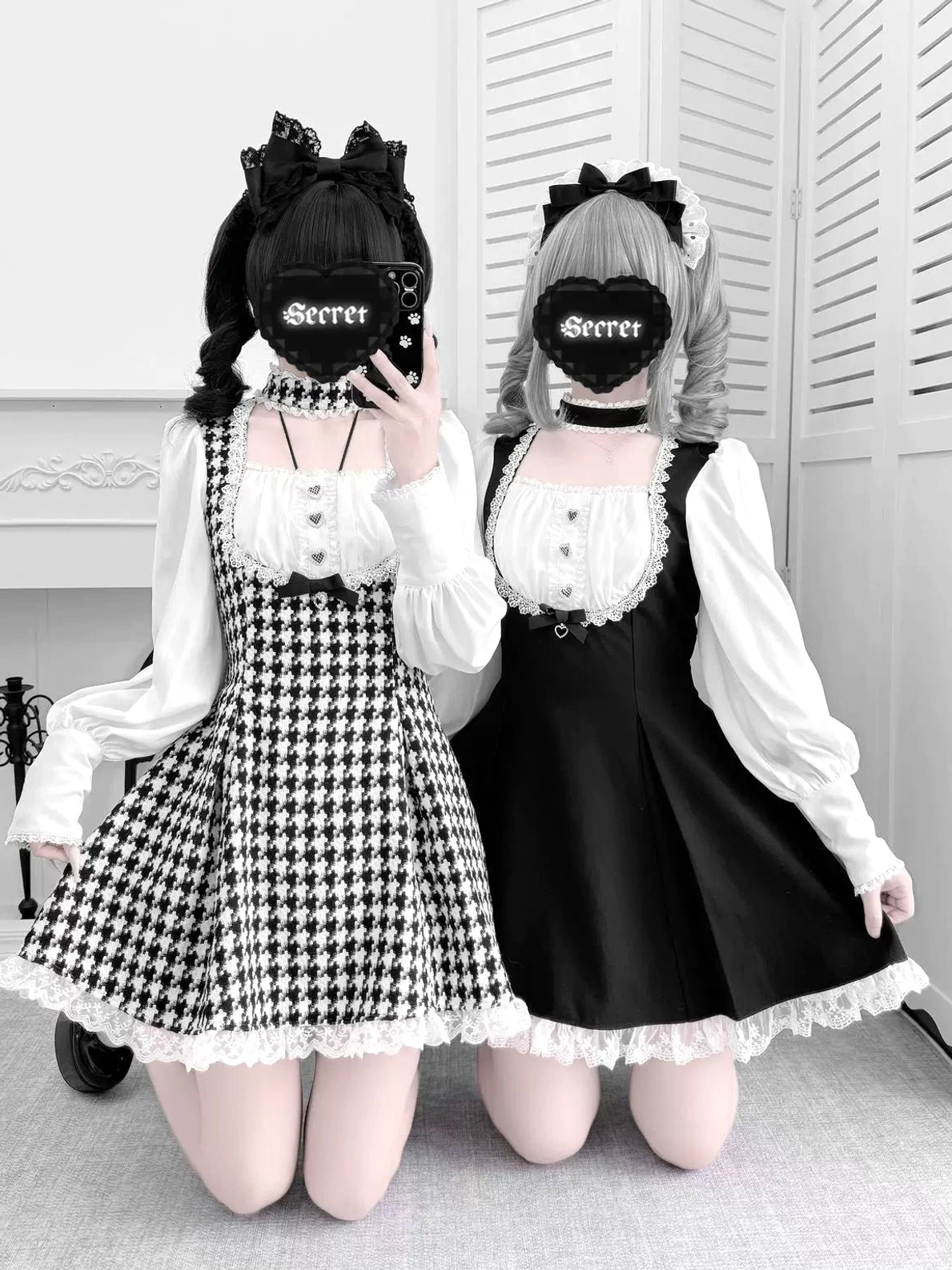Knee-up front view of Jirai Kei maid dress worn with matching hair bow accessories and styled for intimate aesthetic presentation in indoor setting