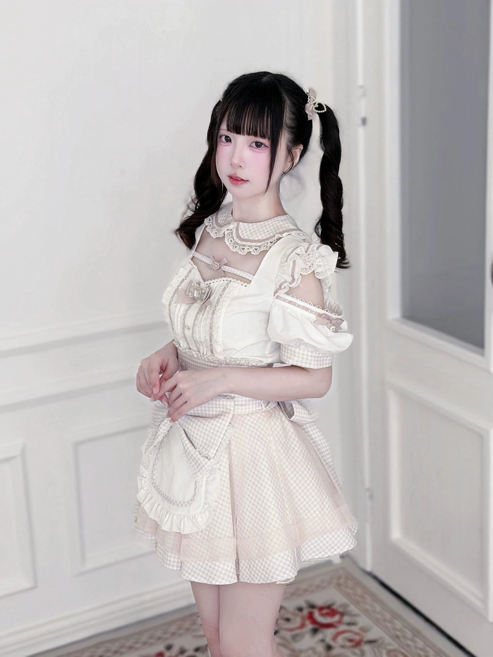 Jirai Kei maid outfit fabric texture close-up showing gingham pattern weave, polyester rayon blend quality, and lace trim details on apron