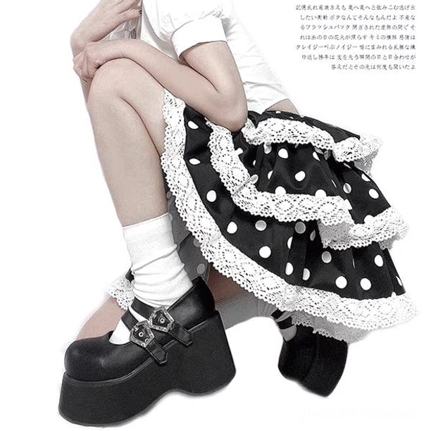 Gothic platform Mary Jane shoes lace red upper dual hexagonal silver buckles detail close-up showing texture and buckle design