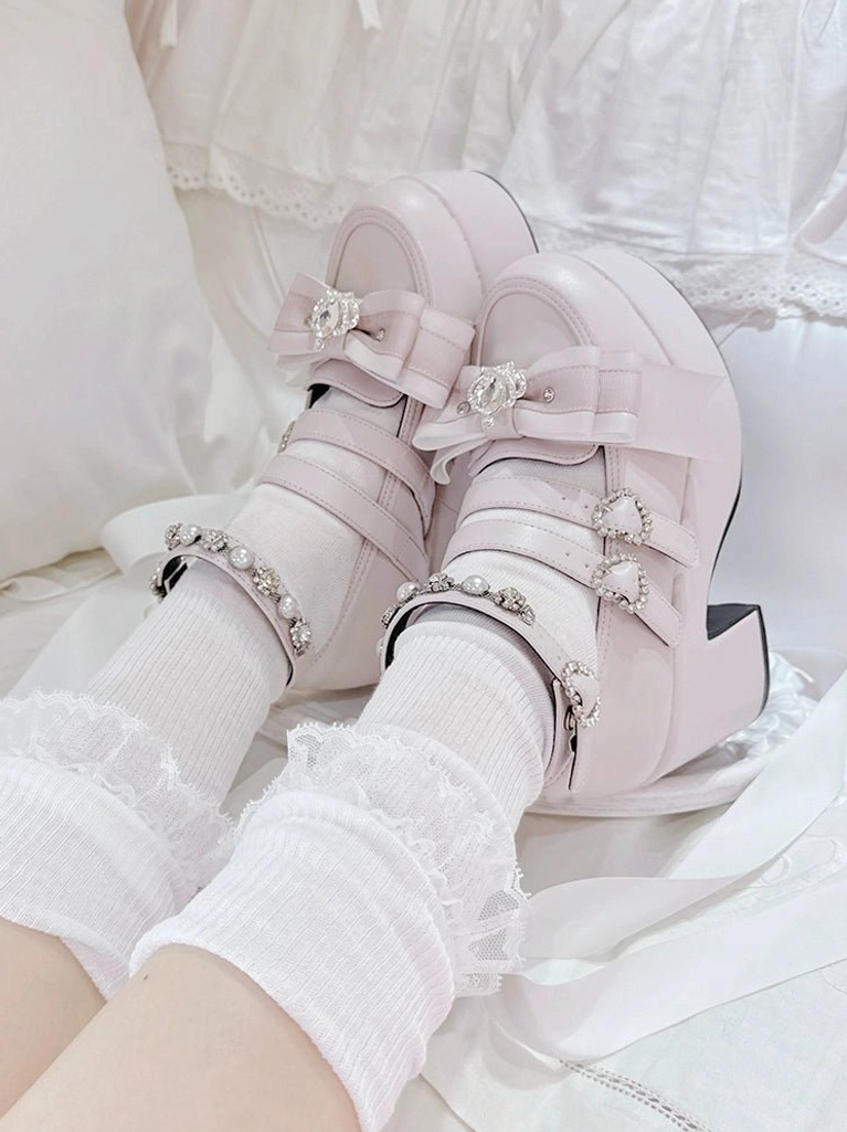 Matte pink Jirai Kei platform chunky heel shoes with dual rhinestone buckle straps and commanding block heel, flat lay presentation