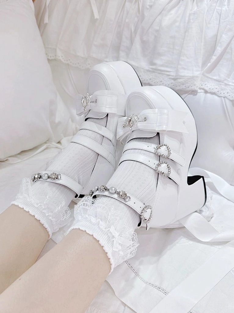 Matte white Jirai Kei platform chunky heel shoes with rhinestone ankle strap and dual buckle design, isolated product view