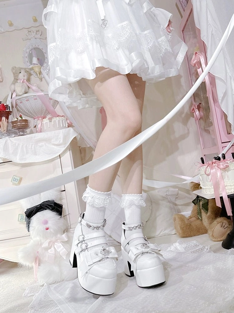 Matte white Jirai Kei platform chunky heel shoes paired with romantic bedroom decor and feminine styling accessories