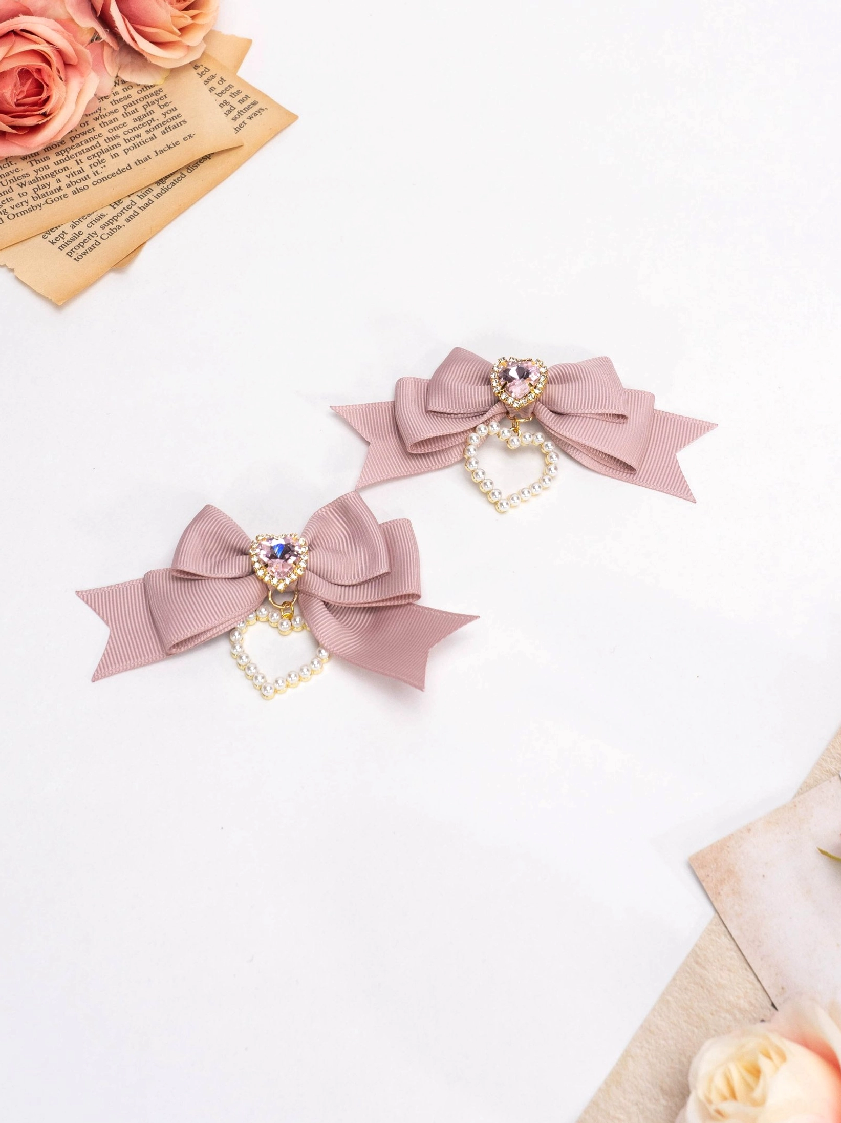 Mauve satin Jirai Kei lolita bow hair clips with rhinestone center and hollow heart pendant design aesthetic