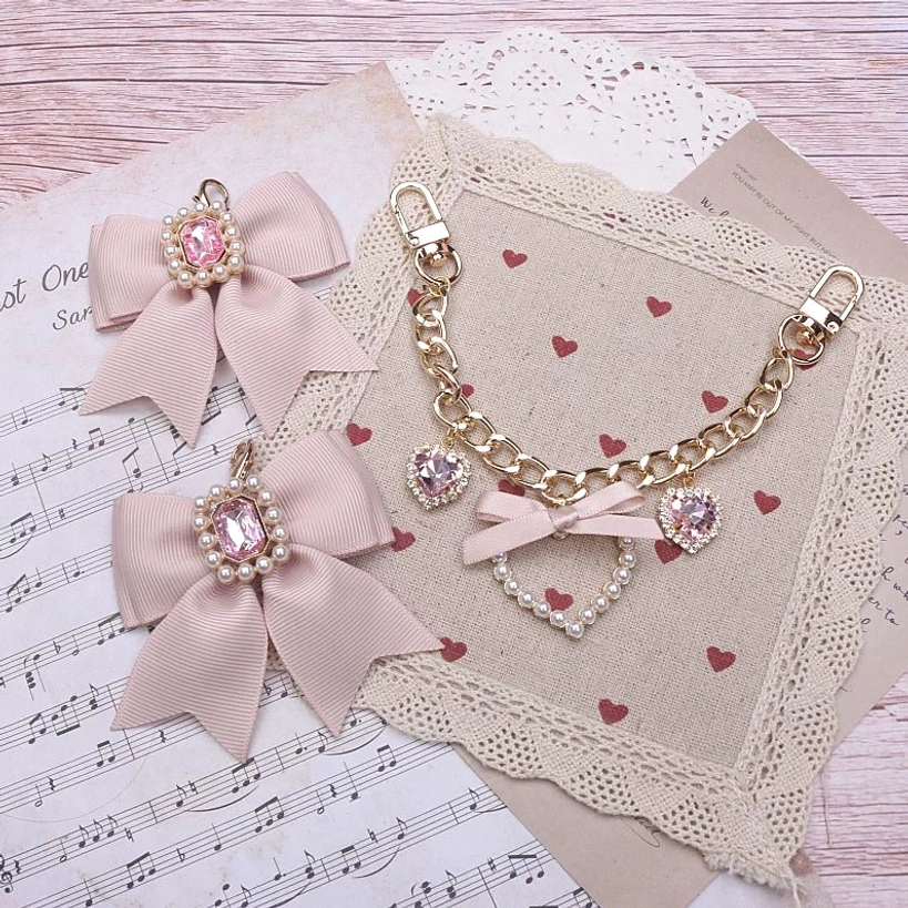 Jirai Kei bag charm milky white bow satin texture rhinstone embellishment detail photography