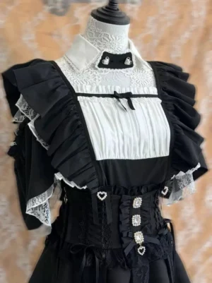 Jirai Kei off-shoulder blouse with detachable collar front mannequin display showing black and white color scheme with lace-trimmed ruffled sleeves and heart-shaped buckle details gothic maid lolita aesthetic