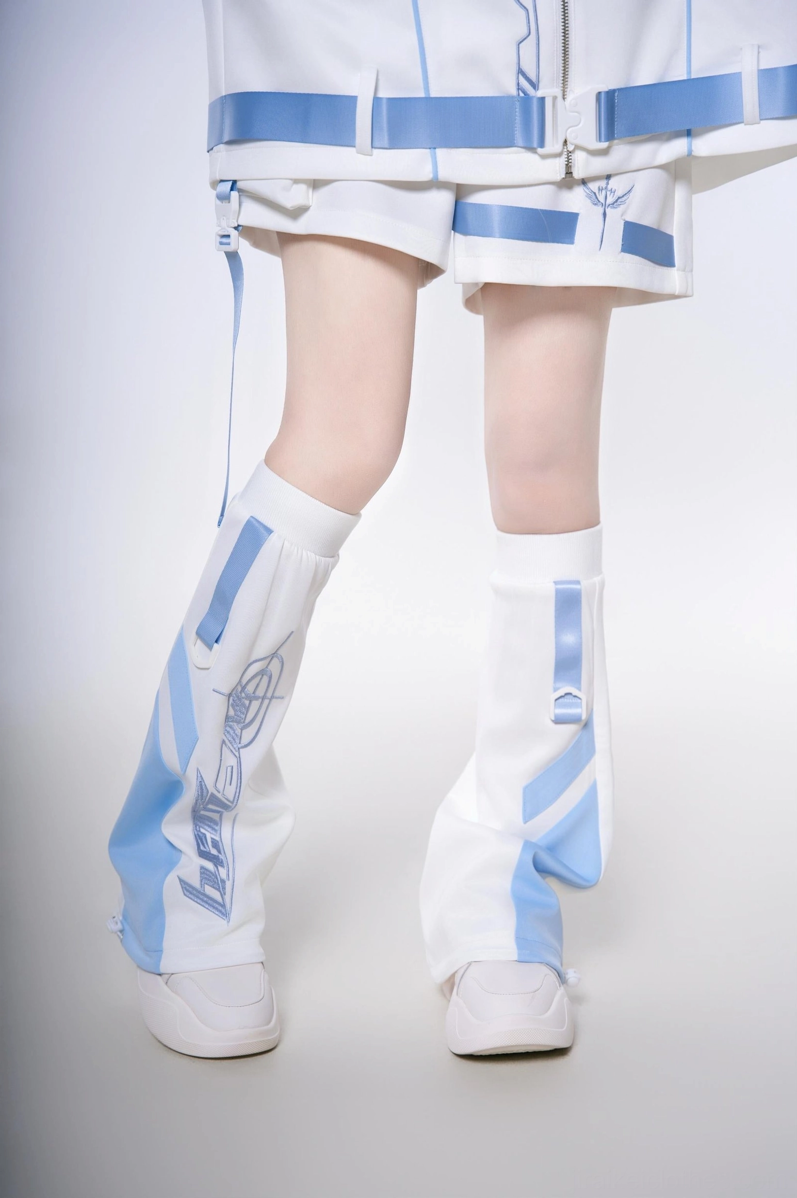 Jirai Kei techwear oversized jacket with blue and white color scheme - side profile view showing silhouette and loose fit