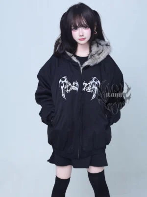 Gothic oversized black padded jacket full front view with removable grey faux fur hood and functional side pockets worn with black skirt and thigh-high socks