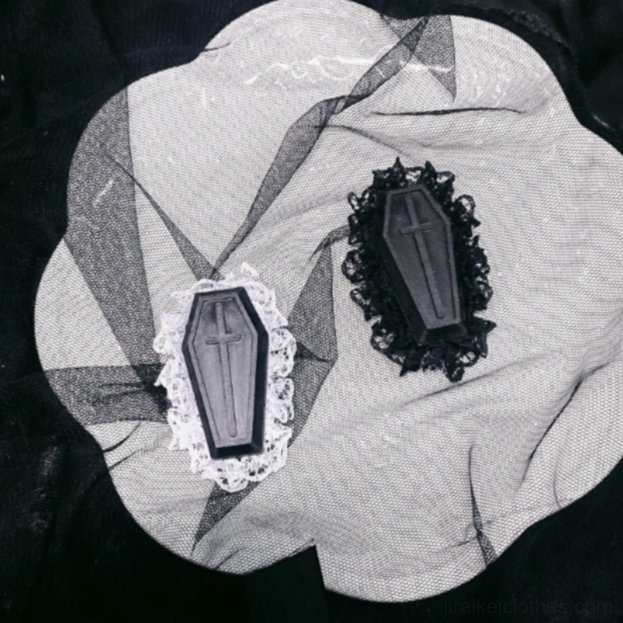 Pair of Jirai Kei bow hair clips with bicolor satin ribbon, text printed straps, and silver metal decorative elements