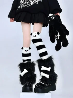 Y2K Jirai Kei panda striped thigh-high socks with black plush leg warmers and white bone accents worn with pleated skirt punk studio outfit
