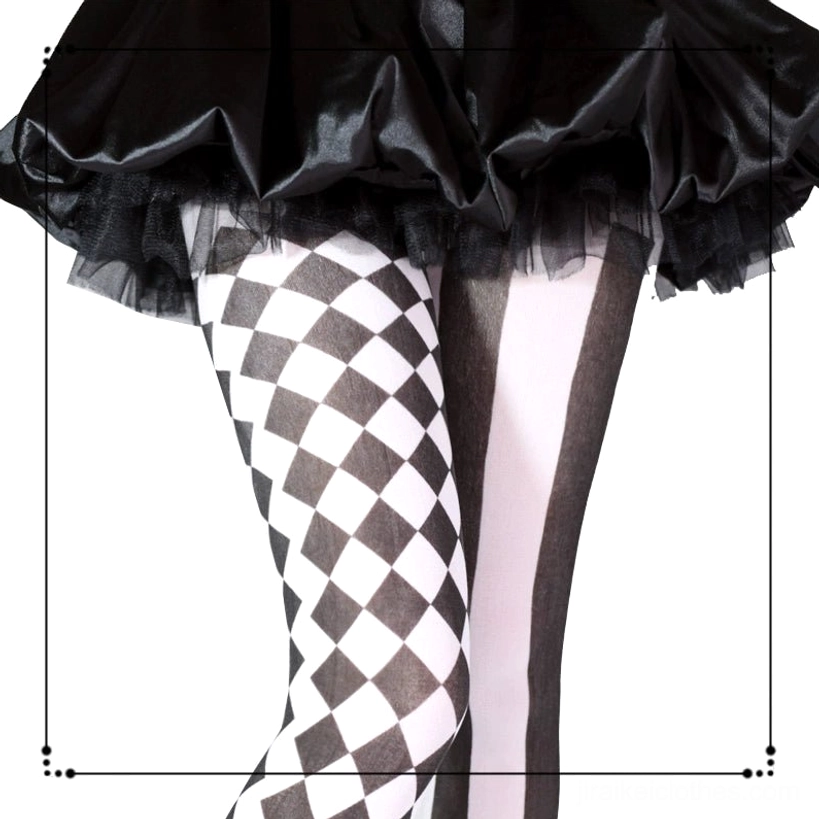 Close-up thigh view of black and white checkered pattern pantyhose with solid stripe detail, displaying fabric texture and pattern precision