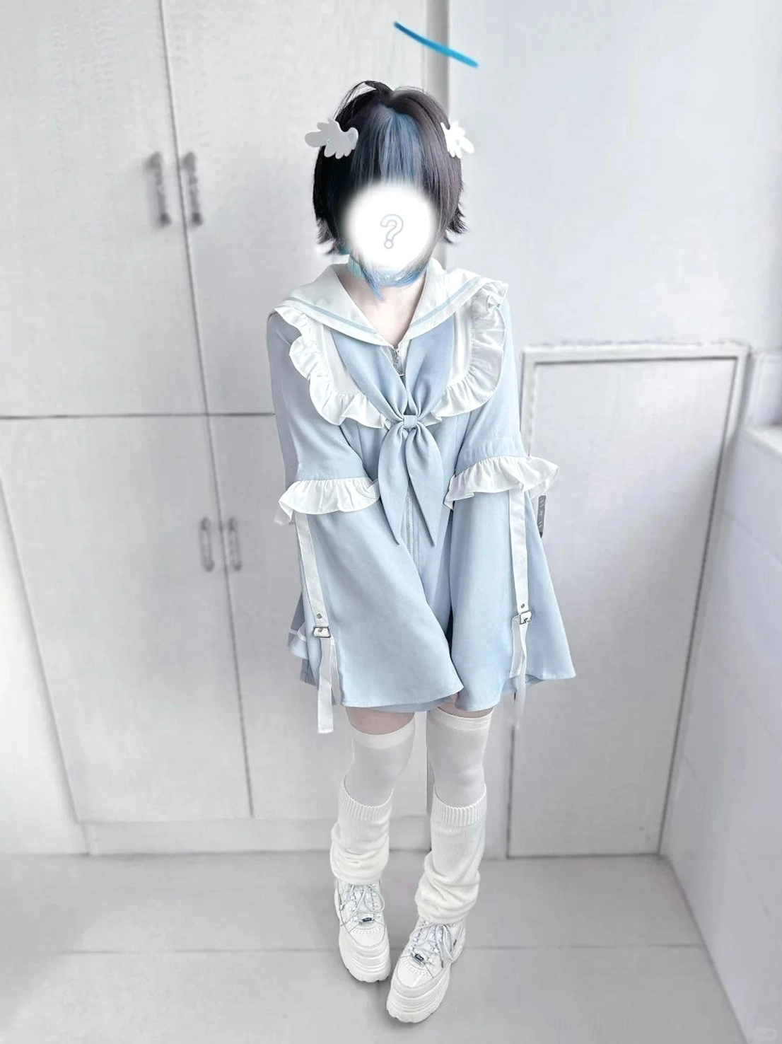 Back view of pastel blue sailor Jirai Kei two-piece set showing matching shorts, zipper closure, and overall silhouette from rear perspective