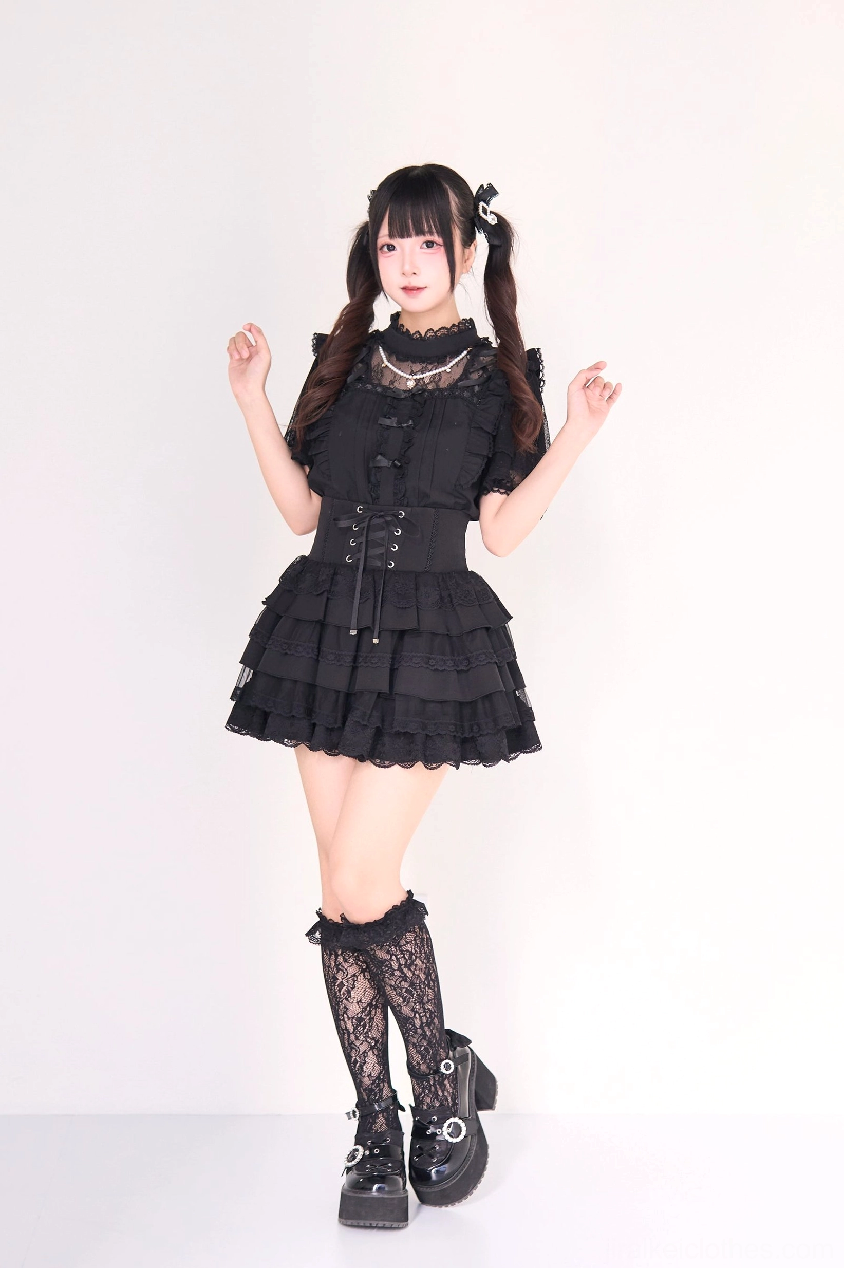 Pearl necklace accessory detail on jirai kei gothic lolita blouse showing luxury jewelry integration with subculture fashion design