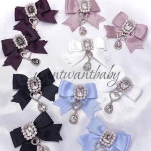 Multi-color Jirai Kei pearl rhinestone bow hair clips overhead flat lay display showing all available colorways with heart teardrop pendants