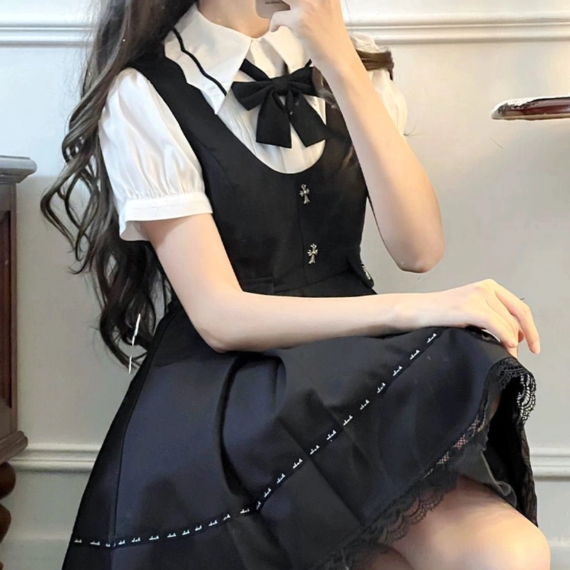 Jirai Kei pinafore dress side angle view cross embroidery stitched skirt trim details sitting