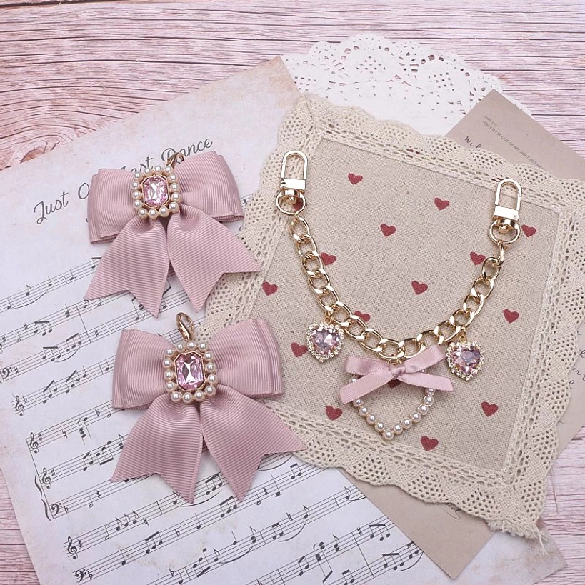 Pink ribbon bow Jirai Kei bag charm rhinestones gold metal chain heart-shaped pendant