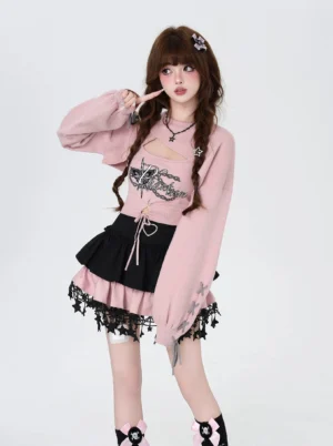 Pink Jirai Kei two-piece knit set with cutout bolero and lace camisole, front full standing view featuring ruffle trim